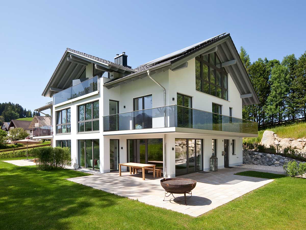 KF 410 | Home Pure | modernes 3 Familienhaus mit Glasbalkon 1
